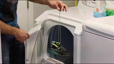 putting tennis shoes in dryer.